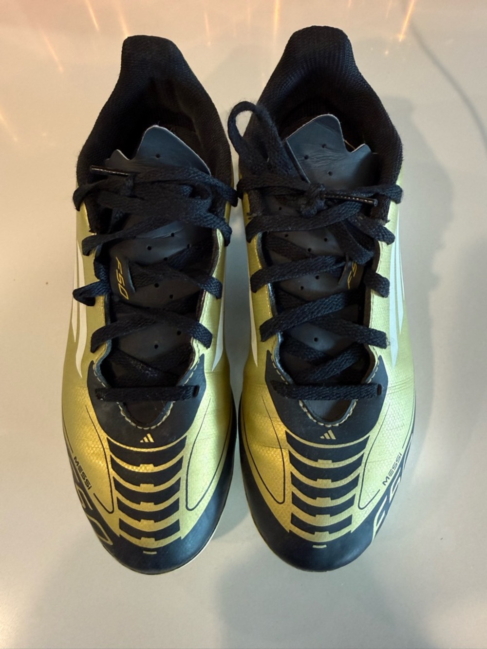 Adidas x Messi Metallic Gold and Black Soccer Cleats
